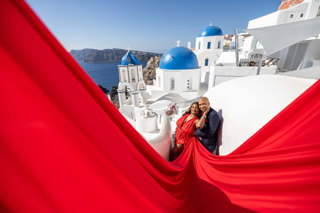 Flying dress photoshoot in Santorini