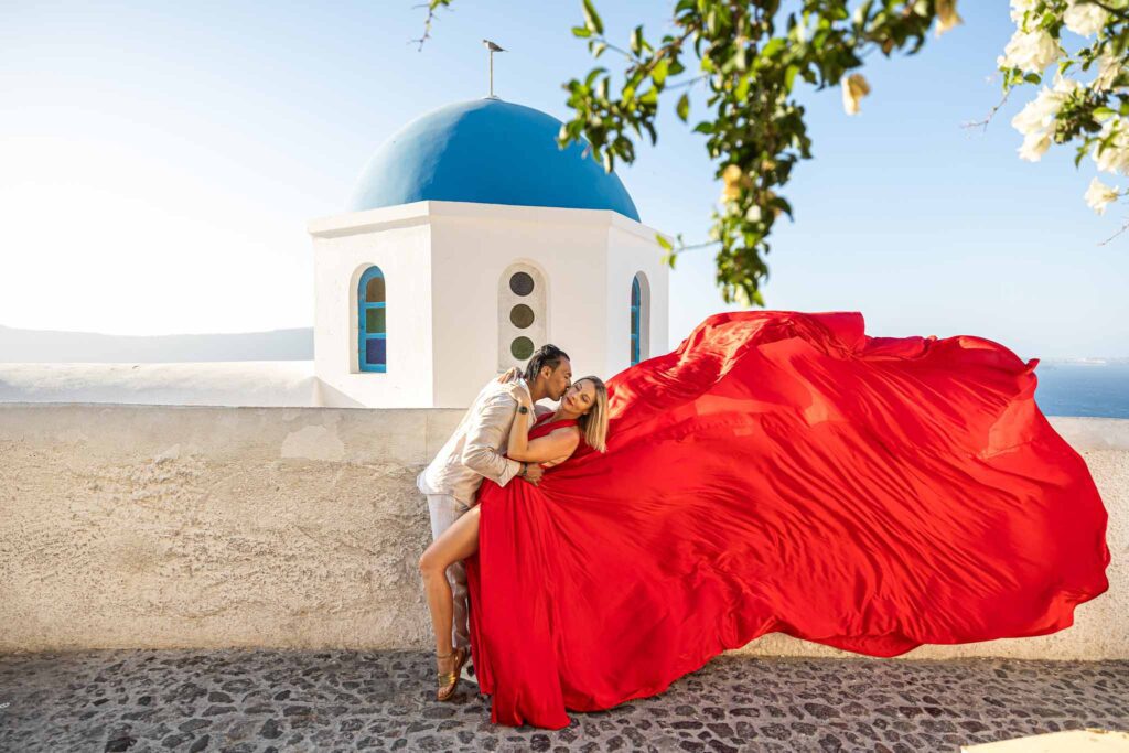 Flying dress photoshoot in Santorini