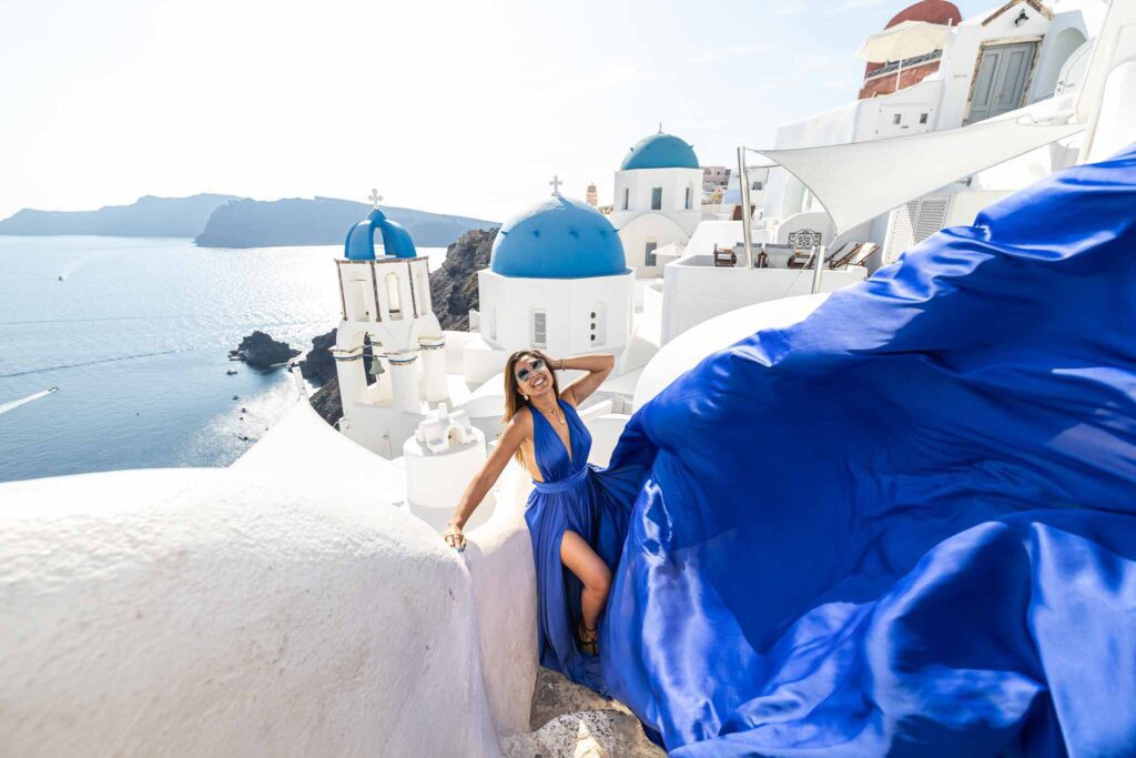 Flying dress photographer in Santorini