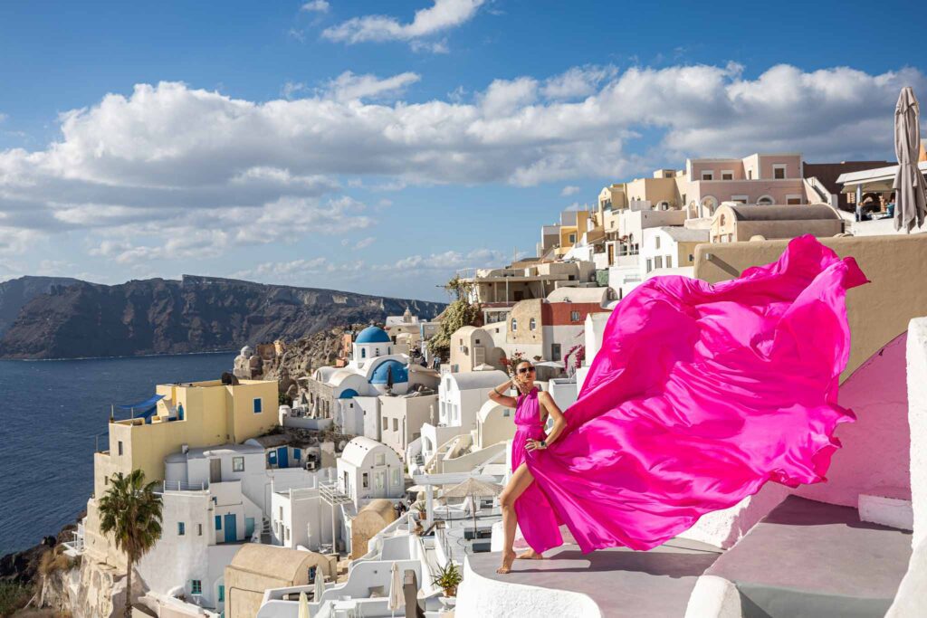 Flying dress photoshoot in Santorini