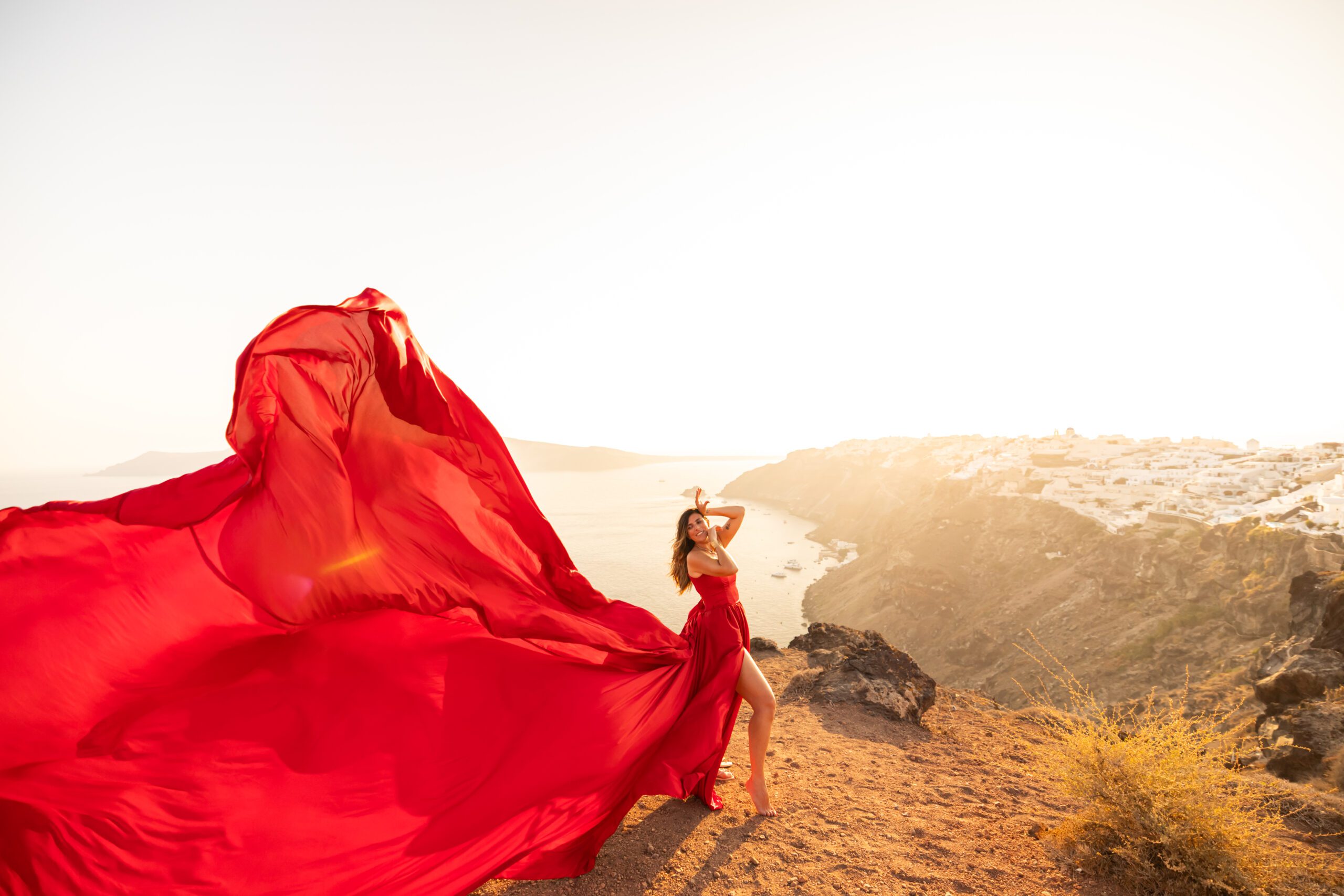 sunset red flying dress santorini